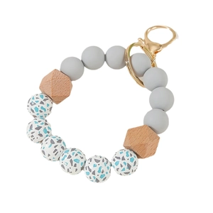 Handmade silicone bead keychain with grey and marble patterns and gold lobster clasp