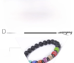 Macro detail of 8mm lava stone chakra bracelet with natural tiger eye and turquoise beads