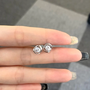 Close-up of S925 sterling silver stud earring featuring a brilliant round zircon stone