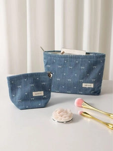 Denim toiletry bag set with white bow and heart embroidery, includes two sizes