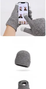 Close-up of grey knit touchscreen gloves and winter beanie from the three-piece set