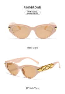 Close-up of pink cat-eye sunglasses with wide temples and golden diamond metal accents
