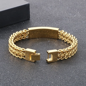 Men's gold-plated stainless steel curb link bracelet with a polished rectangular nameplate