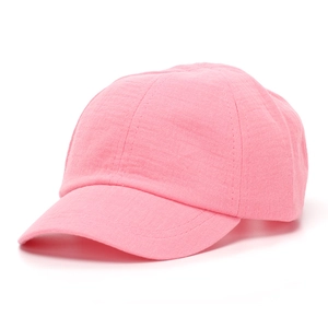 Close-up of pink girls sun hat showing breathable fabric texture and neat stitching