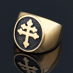 Close-up of gold stainless steel ring with black embossed Cross of Lorraine on mirror base