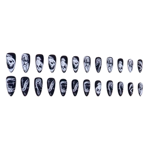 Black matte gothic press-on nails featuring white skull, snake, and spider web patterns