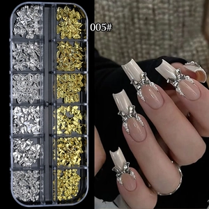 Dettaglio scatola nail art 12 scomparti con fiocchi in metallo oro e argento e perle