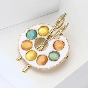 Vintage gold alloy enamel artist palette brooch with colorful cat-eye stone pigments