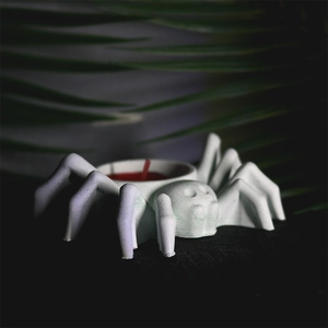 Spider shaped tea light candle holder for Halloween gothic home decor and craft design