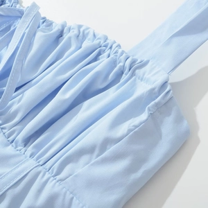 French vintage light blue summer dress featuring ruched chest detail and wide shoulder straps