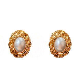 Elegant gold twisted rope oval pearl earrings on a clean white background