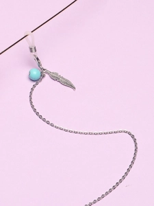 Detail of silver eyewear chain featuring leaf pendant, blue bead and anti-slip rubber loop