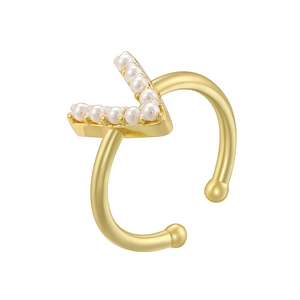 Detailed view of elegant gold V-shaped ring with inlaid pearls and adjustable opening