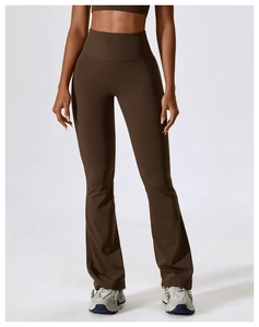 Front view of high waisted flared yoga pants in dark coffee with premium matte texture