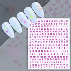 Detail of pink alphabet nail stickers JO-1784 with examples on white nail tips