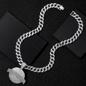 Silver iced-out Cuban chain necklace with a large sparkling planet pendant for men