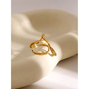 Abstract geometric 18k gold plated stainless steel irregular open ring on a cream tray