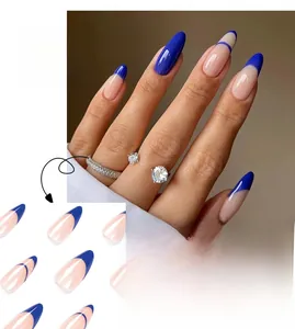 Detail view of Klein blue French tip press-on nails in long almond shape model JP1787