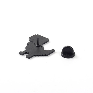 Creative pixel art dinosaur brooch pin with matte black finish and secure rubber clutch