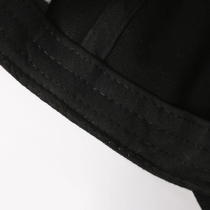 Classic black vintage baseball cap with detailed twill fabric texture and reinforced double stitching