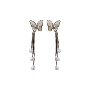 Elegant silver butterfly pearl earrings with tassel design on a clean white background