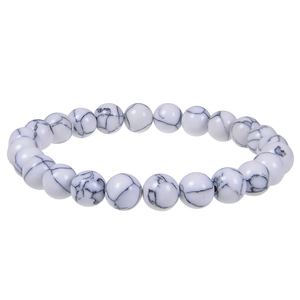Detailed close-up of white marble texture beads and round natural stone bracelets