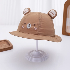Detail of brown baby sun hat with cute bear ears embroidery and adjustable chin strap