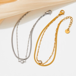 Double-layered snake chain bracelet in stainless steel with a round zircon stone