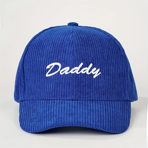 Royal blue corduroy baseball cap featuring white Daddy script embroidery in a retro style