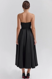 Detail view of the elegant black satin backless midi dress with corset style and back zipper