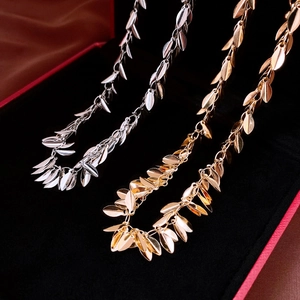 Chic metallic wheat leaf pull-through necklaces in gold and silver finishes