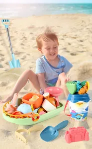 Detailed set of colorful kids beach toys with shovels, bucket, and sand molds on the beach