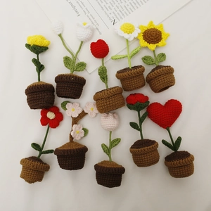Handmade crochet potted plants featuring sunflower tulip and rose floral decorations