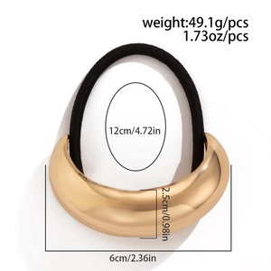 Detail shot of golden metal ponytail holder showing size and 49.1g weight specs