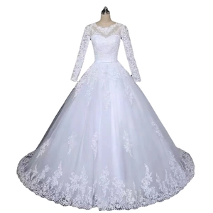 Elegant white lace long-sleeve A-line bridal gown with a full tulle skirt and belt