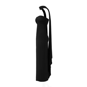 Detail view of the sleek backless halter neckline and ruched bodice on a black maxi dress