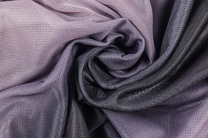 Detail of purple and black gradient mesh fabric with fine breathable texture