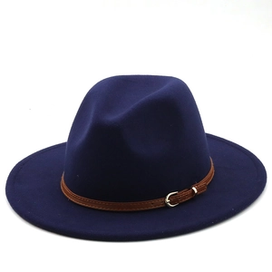 Detail of navy blue wool fedora hat featuring a brown leather belt with silver buckle