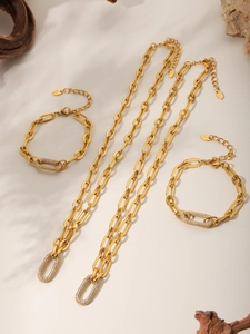 Detailed set of gold stainless steel necklaces and bracelets with micro-pave cubic zirconia
