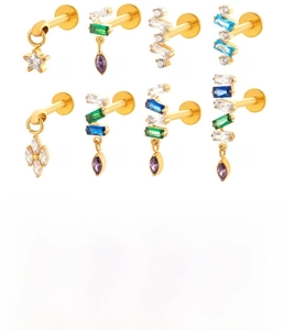 Detail view of titanium labret studs with zircon pendants in various geometric shapes