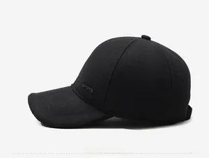 Detailed side view of black winter baseball cap featuring white SPORTS embroidery detail