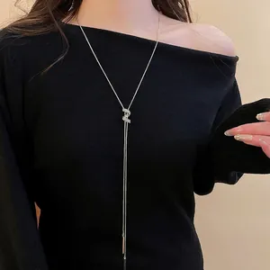Long adjustable silver snake chain necklace with sparkling zircon infinity pendant