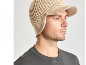 Detail showing the rib-knit texture and earflap design of this beige winter visor hat