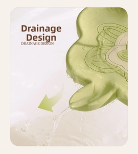 Close-up of light green floral silicone soap holder with efficient drainage design