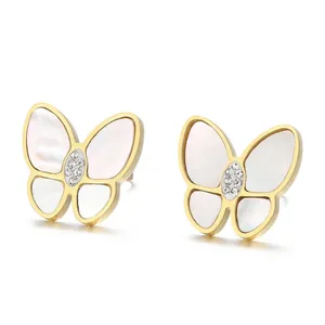 Elegant 3D butterfly stud earrings featuring white shell wings and shimmering rhinestones