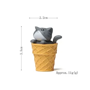 Miniature gray striped cat in yellow waffle ice cream cone resin figurine desktop decor