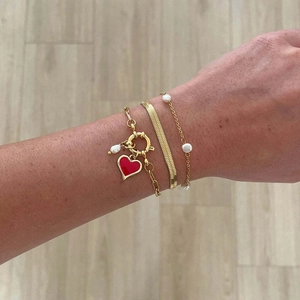 Gold layered bracelet set with red heart charm, pearls and sleek snake chain links