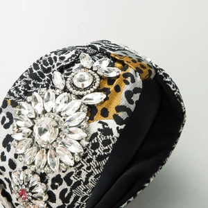 Baroque leopard and houndstooth headband with sparkling crystal floral embellishments