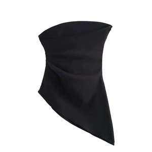 Detail view of black asymmetric tube top featuring side hidden zipper and pleated texture