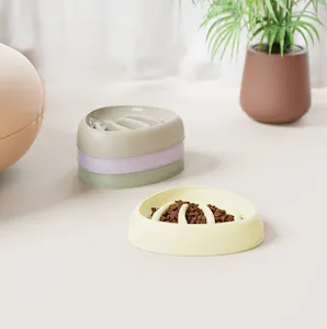 Detailed slow feeder pet bowl in pastel colors with elevated ridges to prevent choking